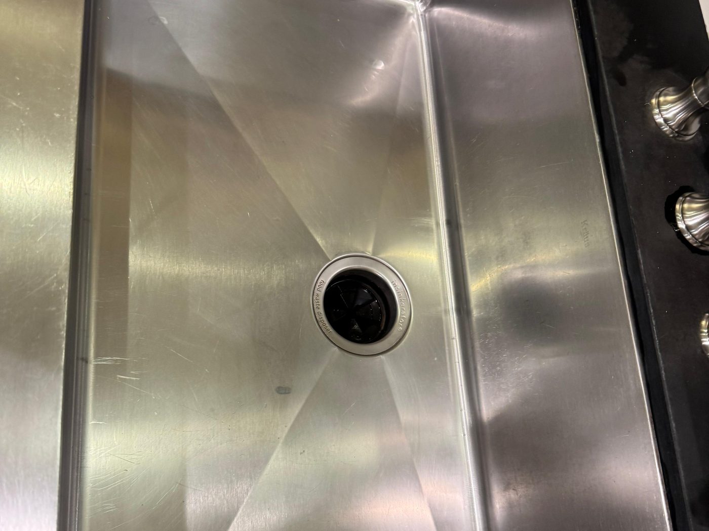 Stainless steel sink polished to a shine after cleaning